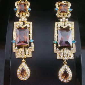 A Pair Of Red Rubies And Diamond Earrings